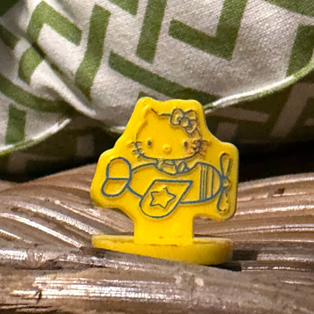 Yellow Hello Kitty vintage stamp 1983